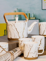 White Gold Porcelain Tea Set (Set of 1pc Tea Pot with Lid & 6pcs Mugs)